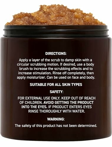 Jar of body scrub with usage directions and safety warnings.
