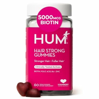 Hum Hair Strong Gummies bottle with heart-shaped gummies.