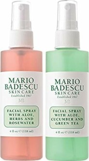 Two bottles of Mario Badescu facial spray, one with aloe, herbs, and rosewater, and the other with aloe, cucumber, and green tea.