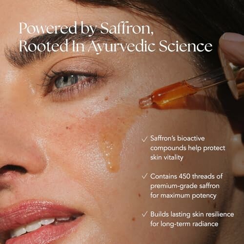 Close-up of a woman's face with saffron-based serum applied, highlighting skincare benefits.