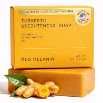 Turmeric Brightening Soap with turmeric root and leaves.